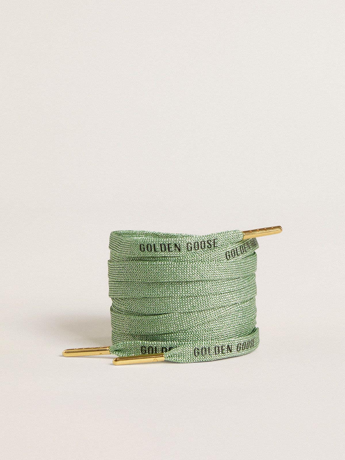 Aqua-green Lurex laces with contrasting black logo