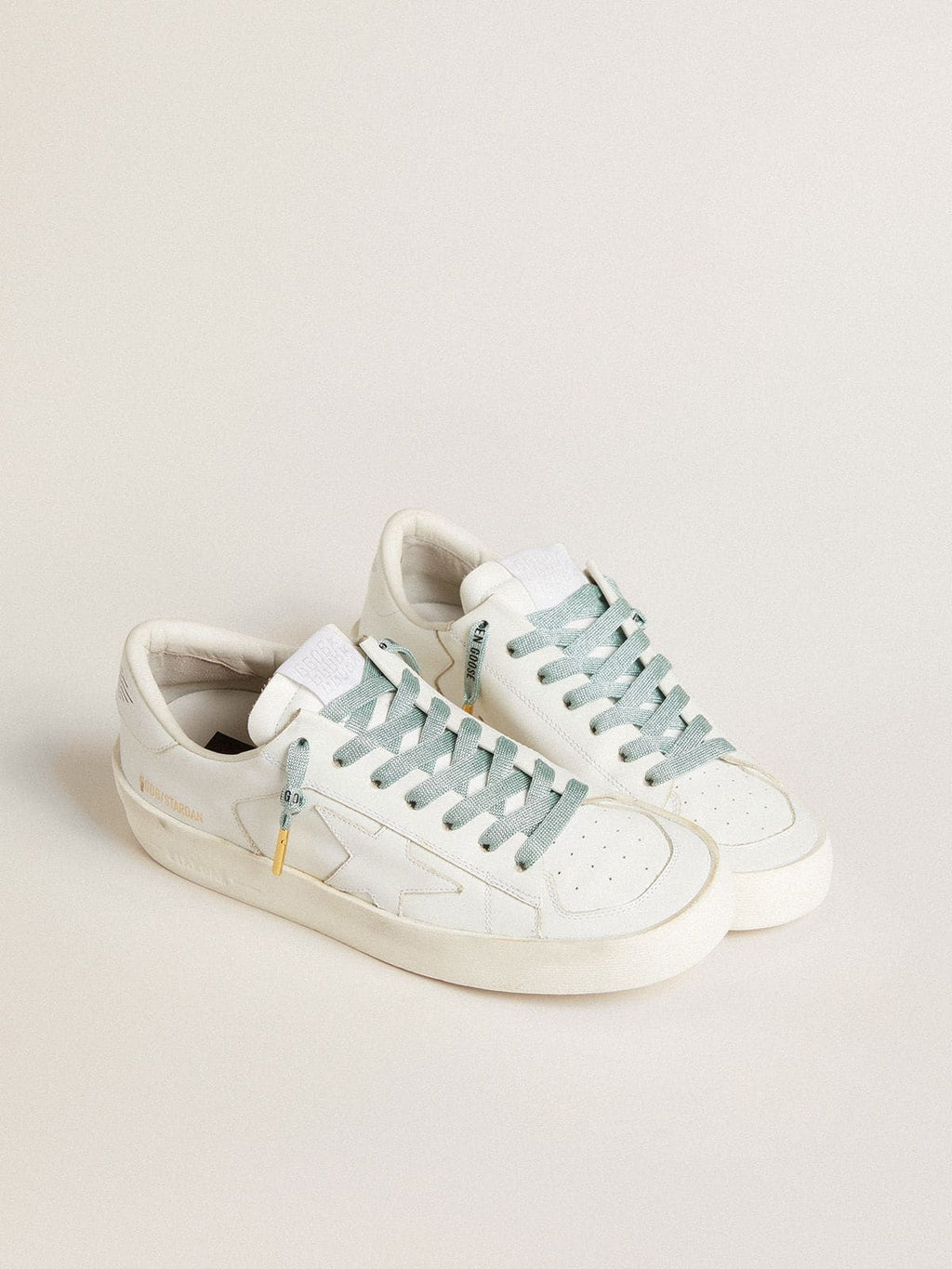 Gray Lurex laces with contrasting black logo