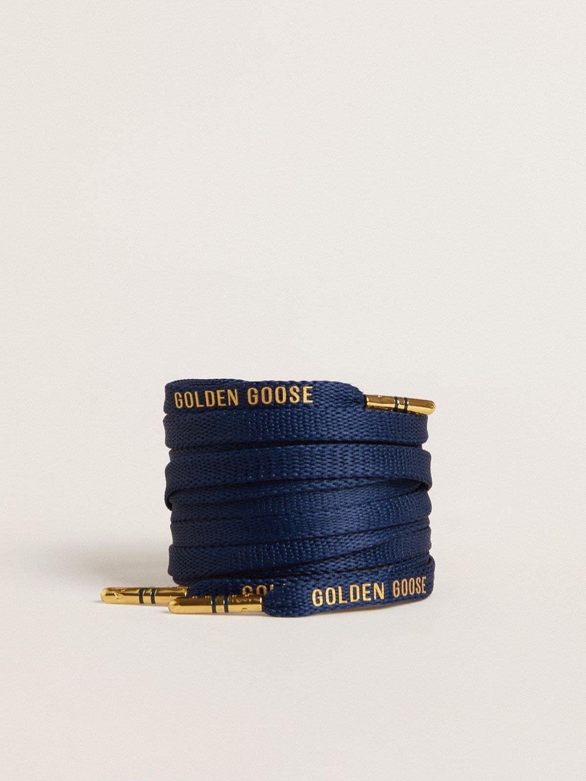Blue cotton laces with contrasting gold-colored logo