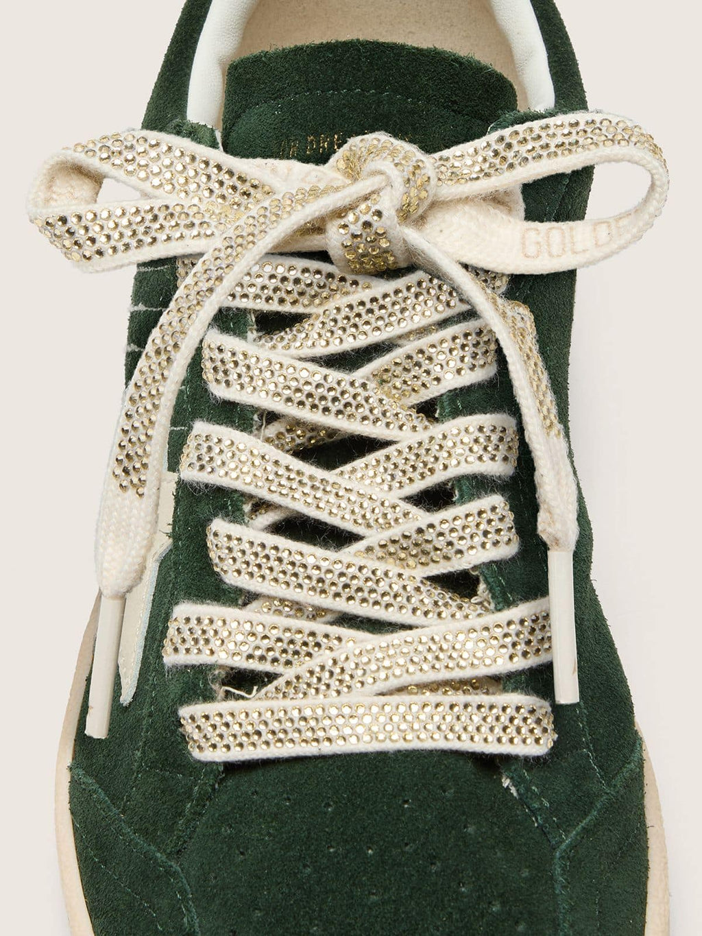 Cotton laces with silver Swarovski crystals and gold-colored logo