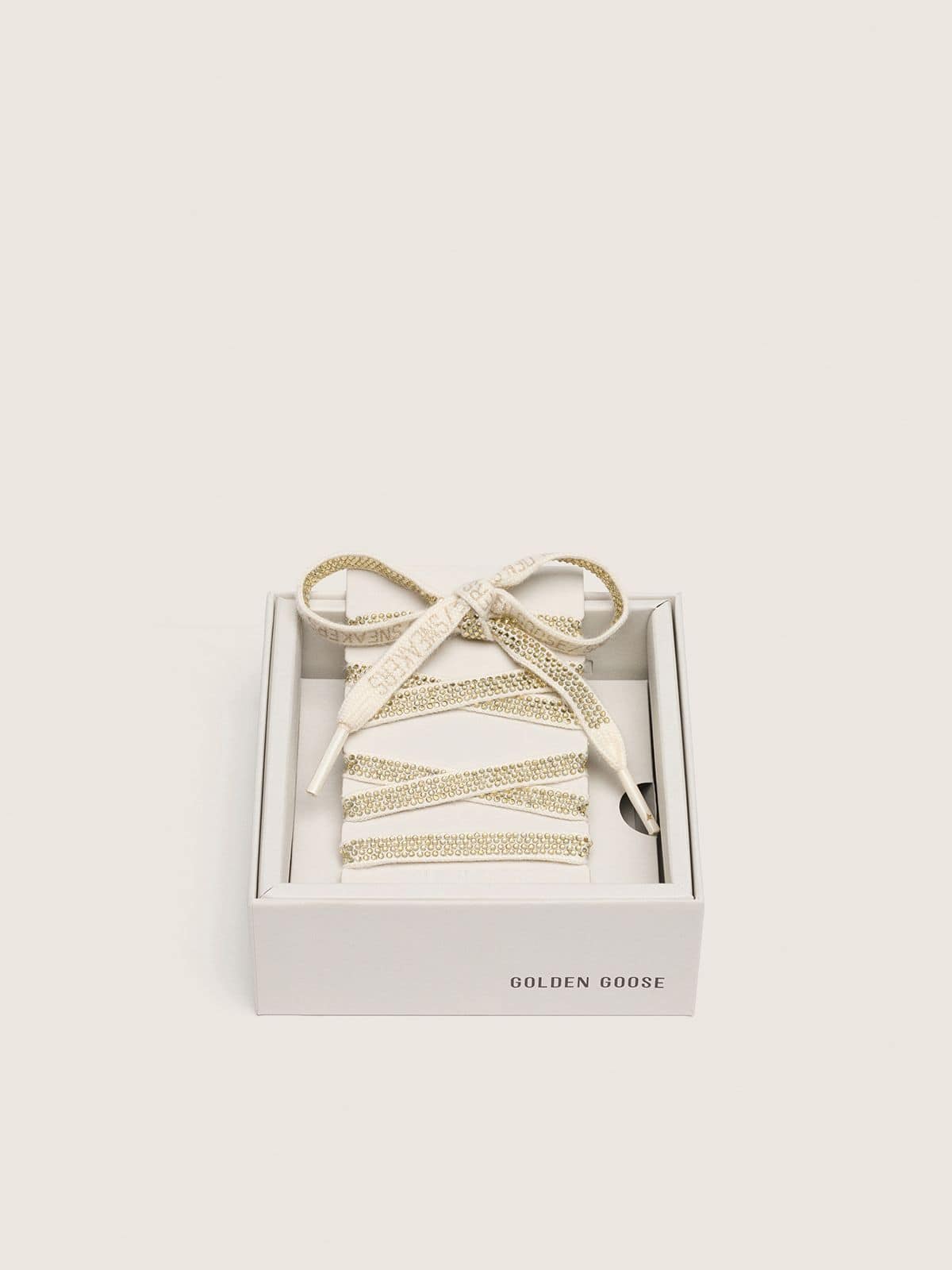 Cotton laces with silver Swarovski crystals and gold-colored logo