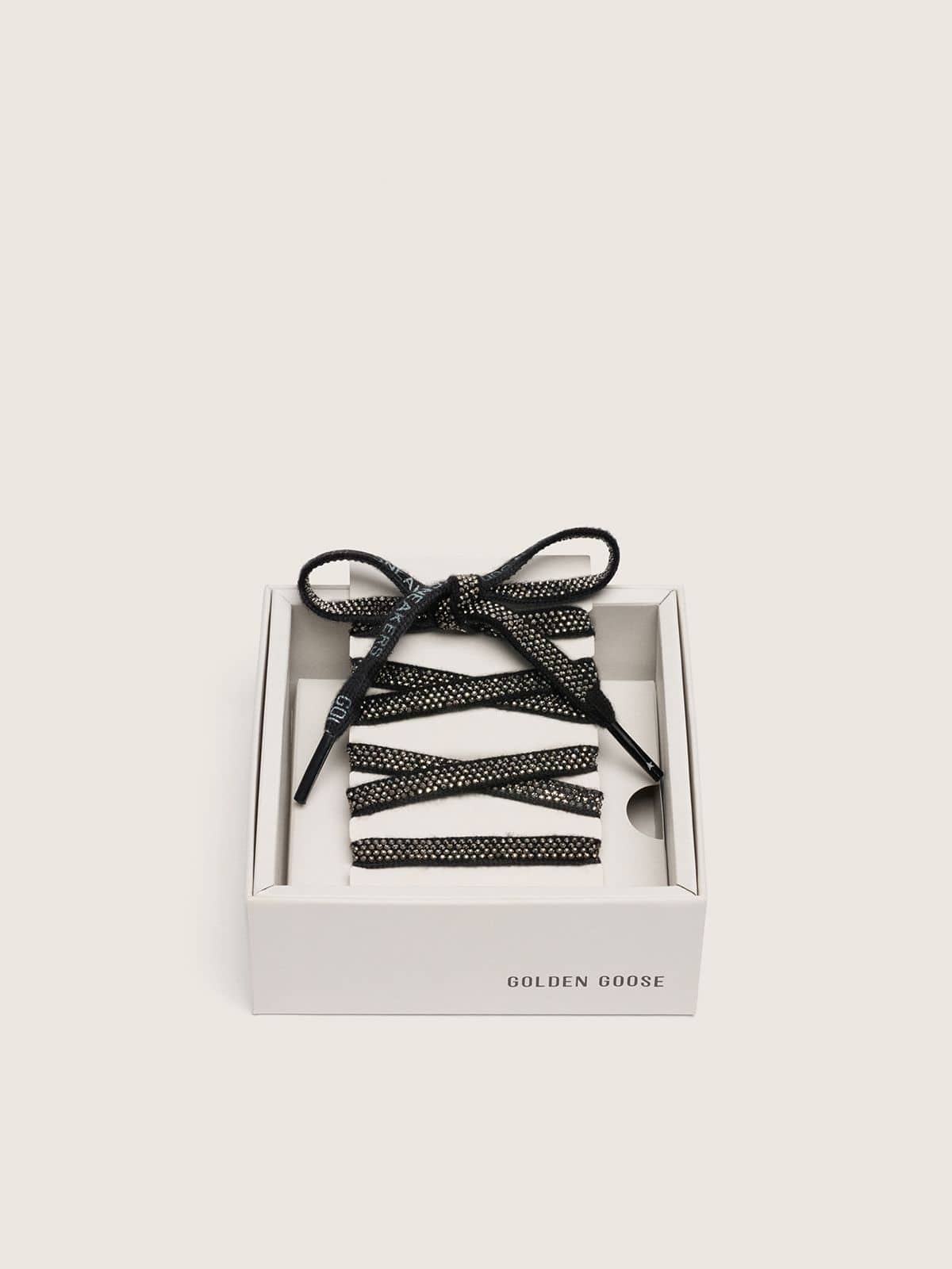 Black cotton laces with silver Swarovski crystals and white logo