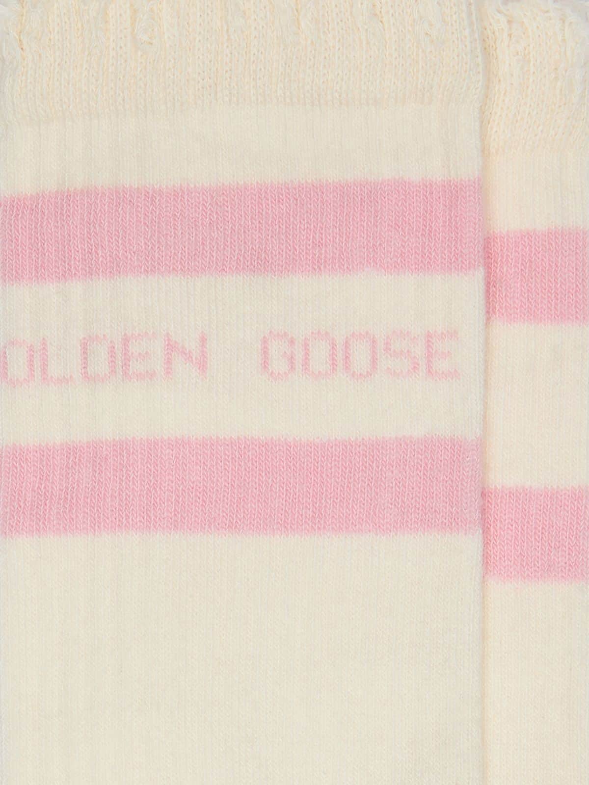 Distressed-finish white socks with baby-pink logo and stripes