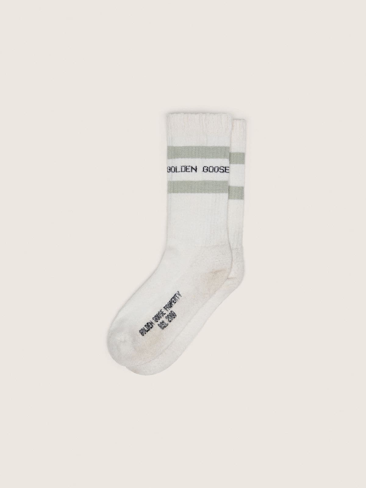 White socks with distressed details and gray stripes