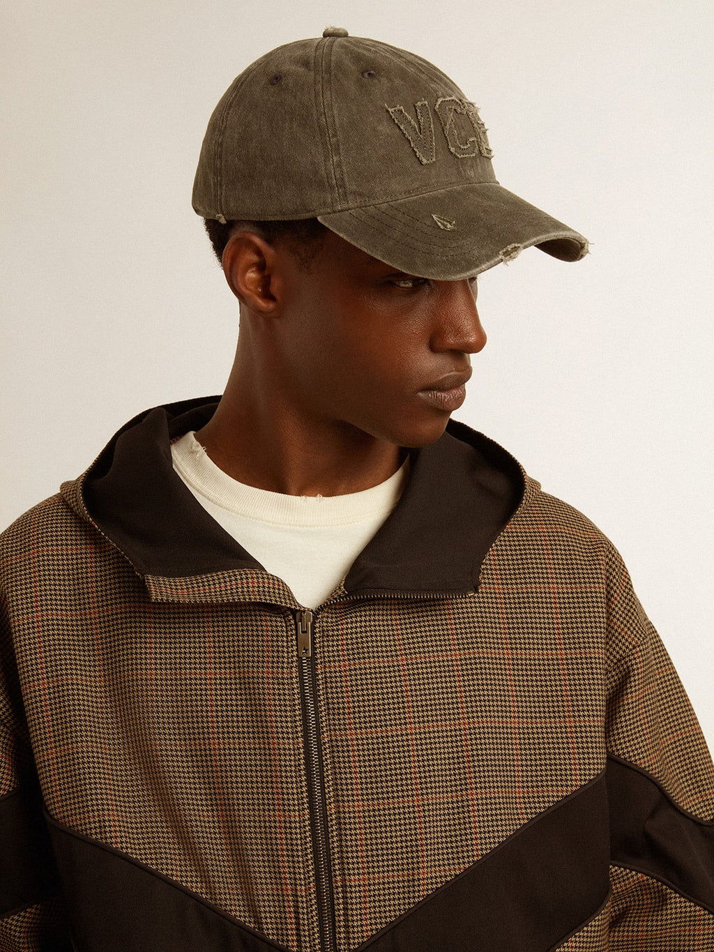 Olive-green cotton baseball cap with a lived-in finish