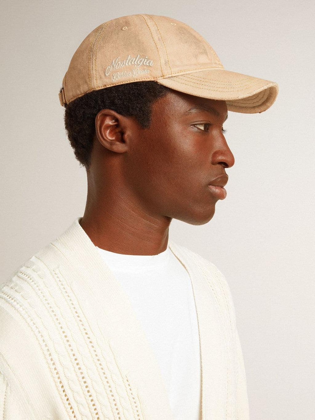 Beige baseball cap with a lived-in finish