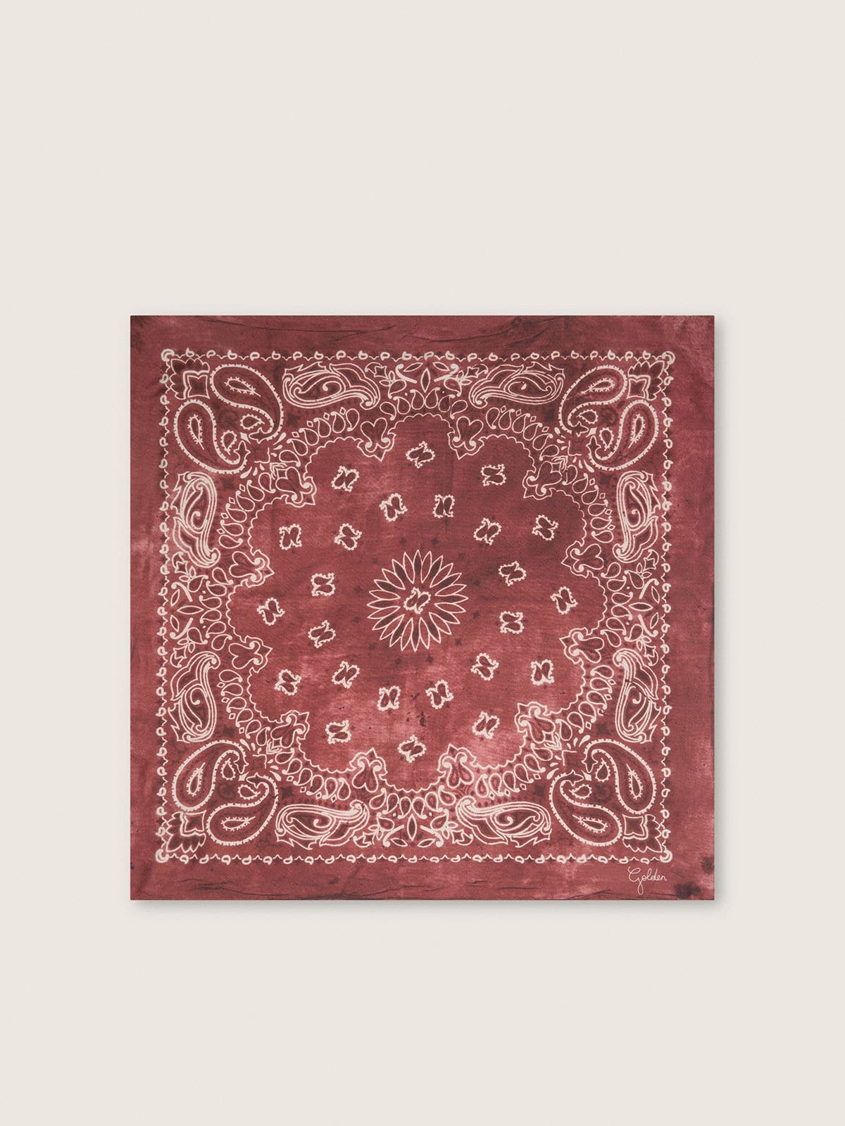 Burgundy scarf with paisley pattern