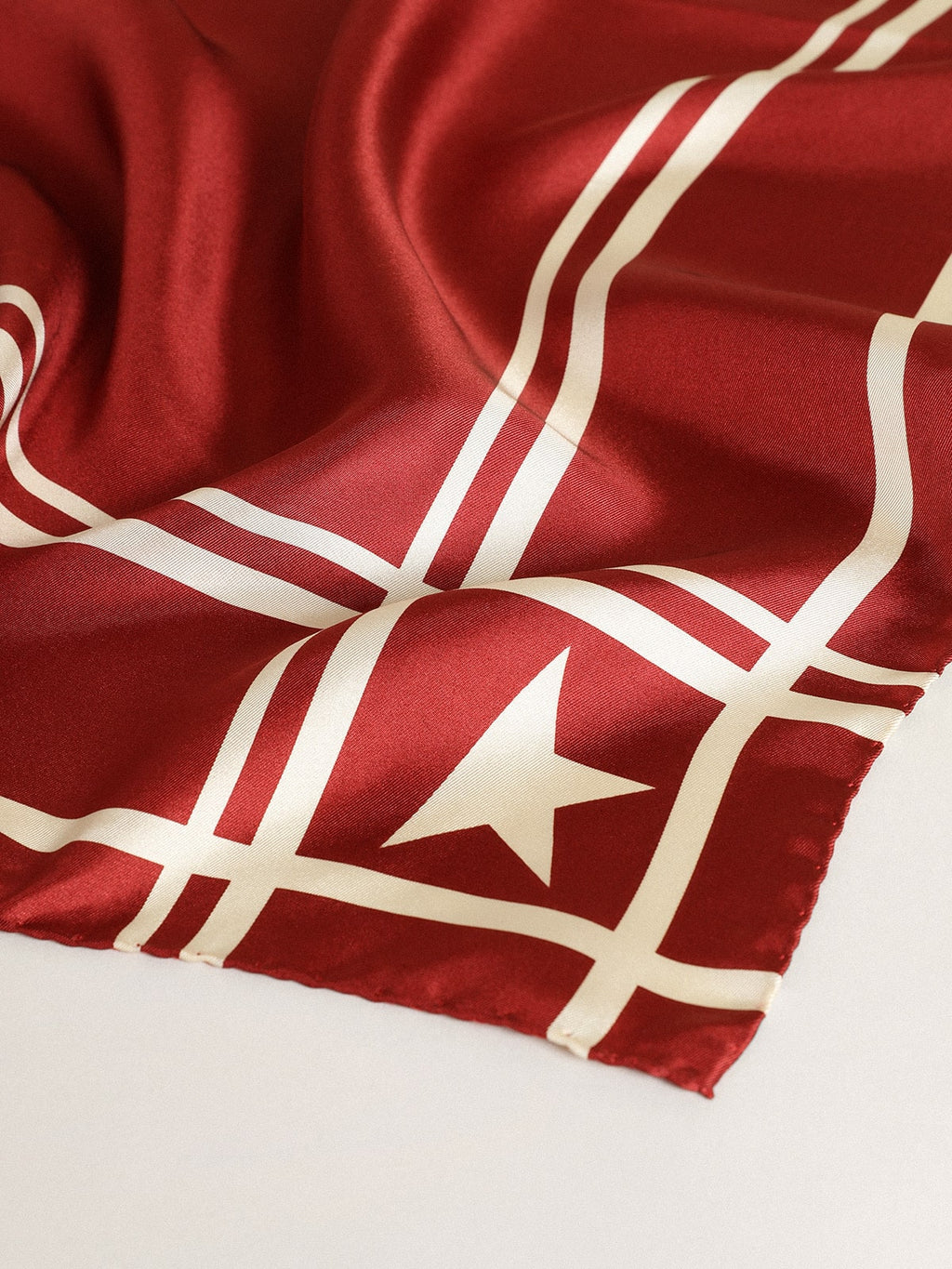 Red scarf with contrasting white stars and stripes
