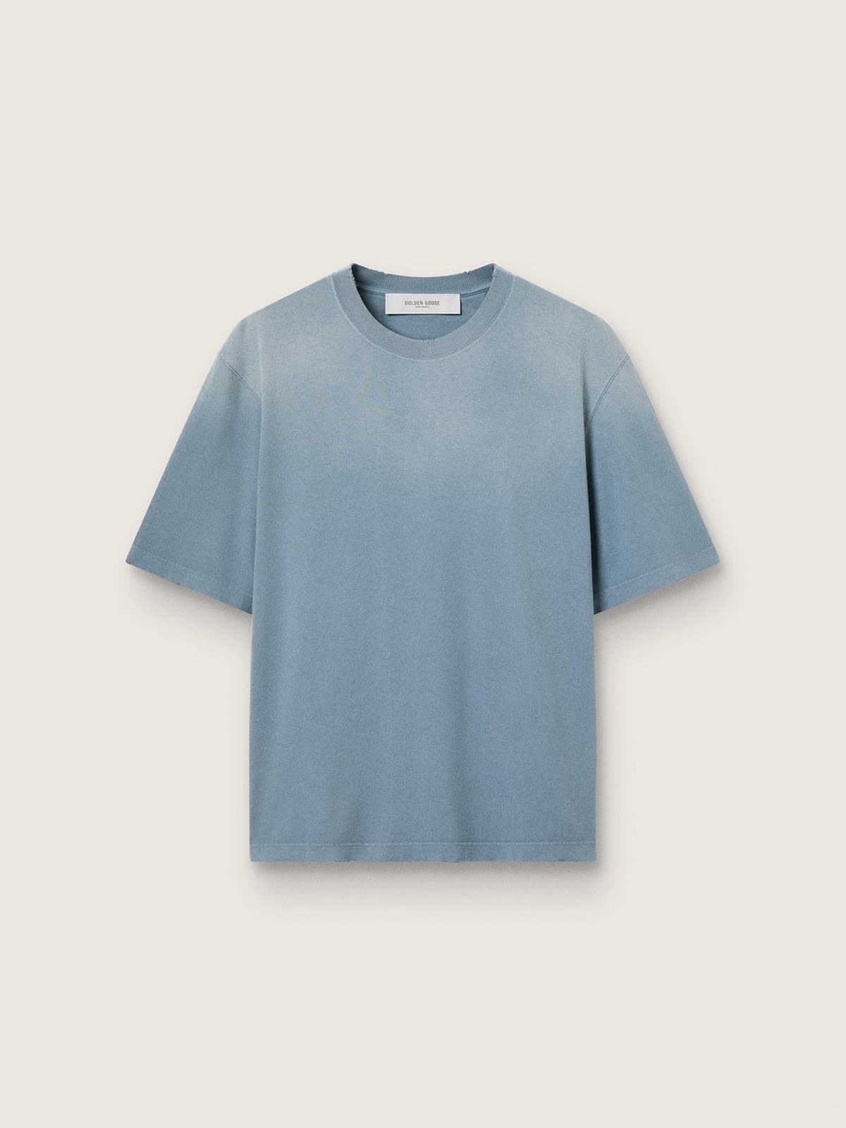 Unisex cotton T-shirt in baby blue with reverse print on the back