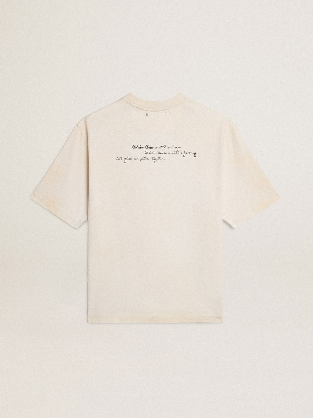 Worn-white unisex T-shirt with printed lettering
