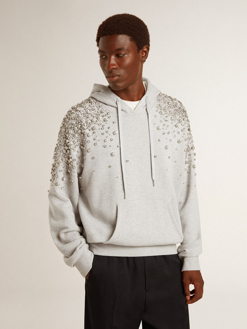 Gray hooded sweatshirt with crystal decoration