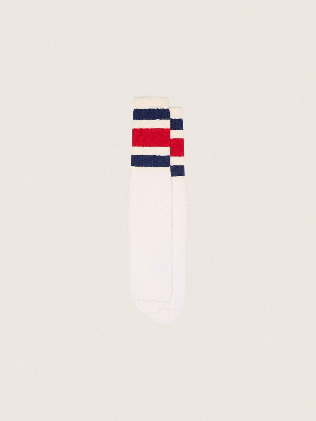 Worn-white socks with distressed details and black and red stripes