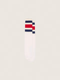 Worn-white socks with distressed details and black and red stripes