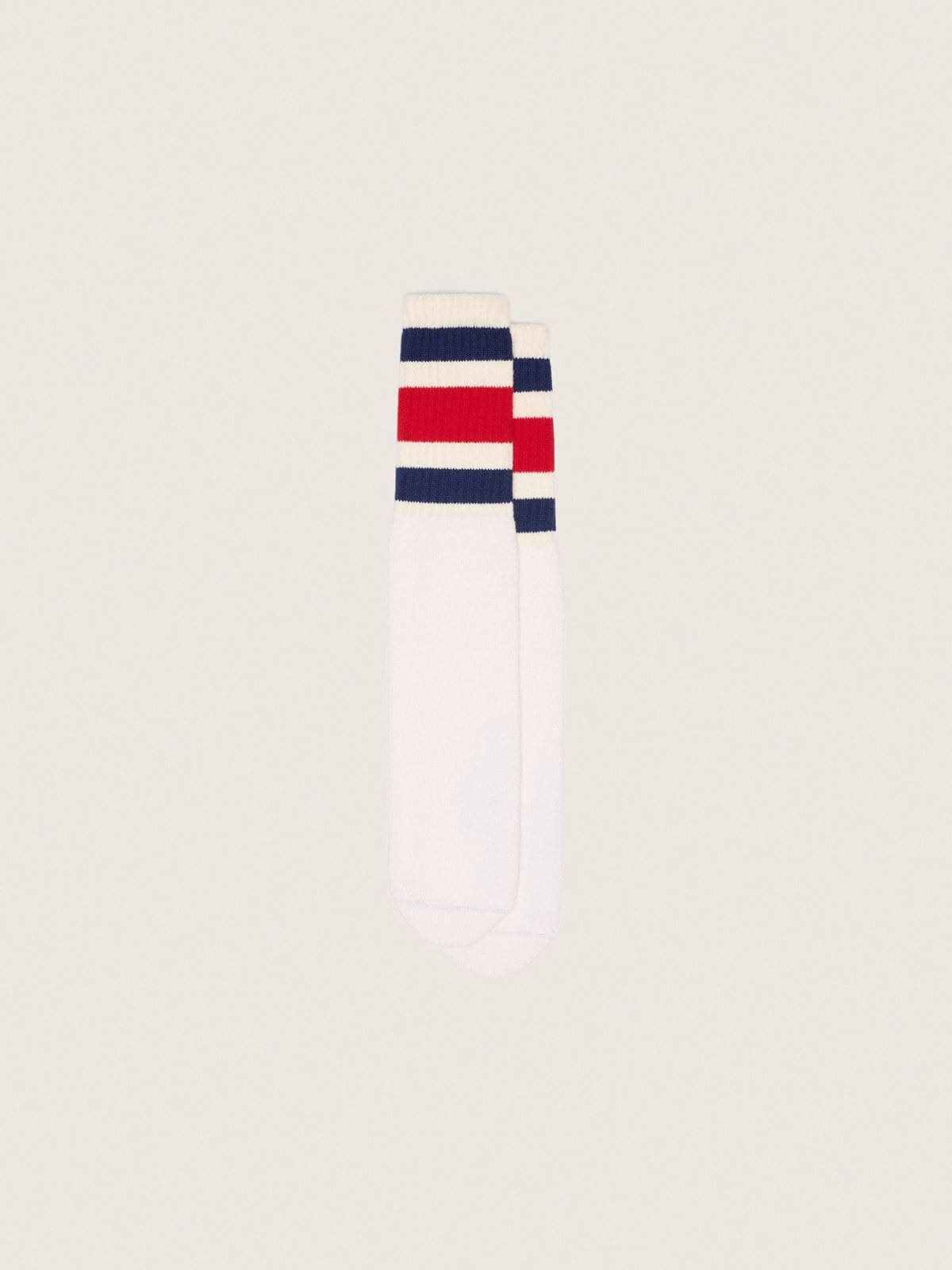 Worn-white socks with distressed details and black and red stripes