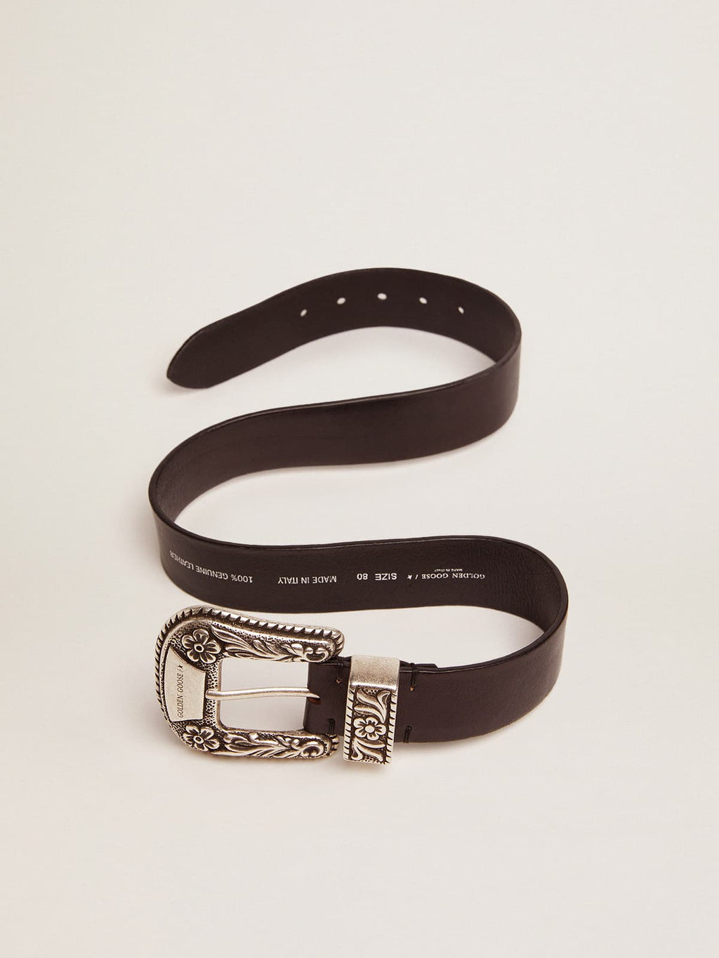 Women's belt in black leather with silver decorated buckle