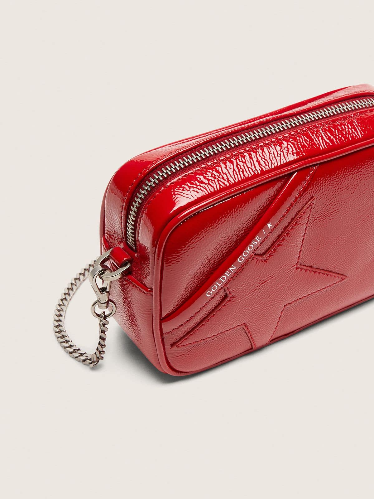 Women's Mini Star Bag in red painted leather with tone-on-tone star