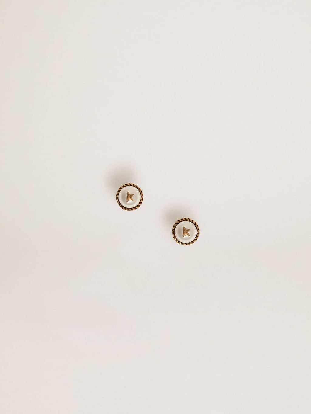 Women's stud earrings in antique gold color