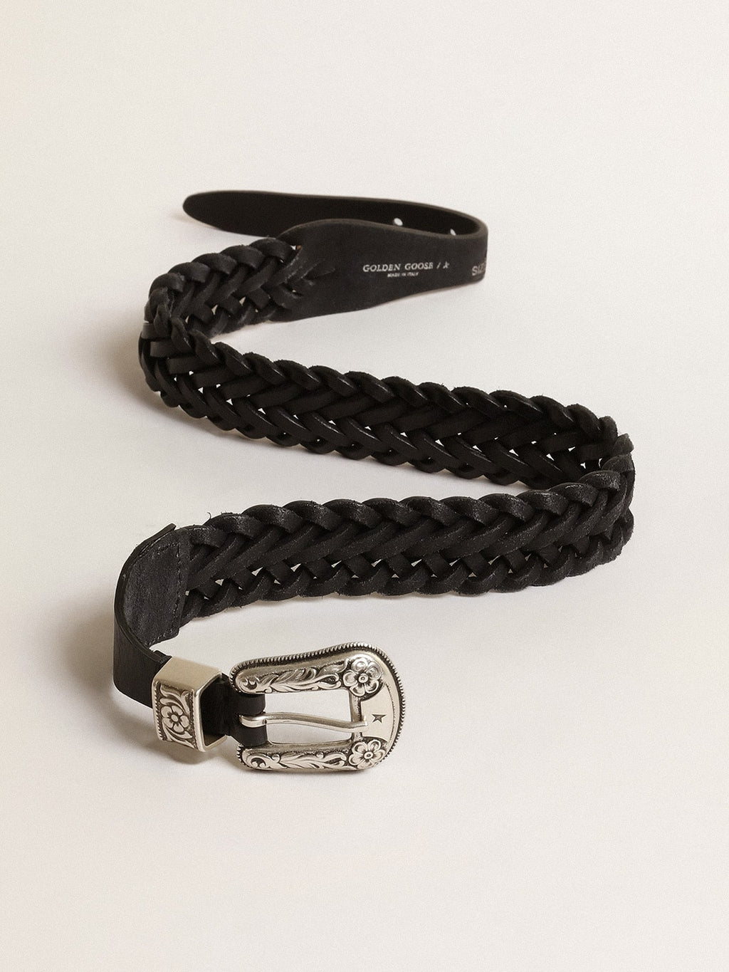 Belt in black braided leather with silver color buckle