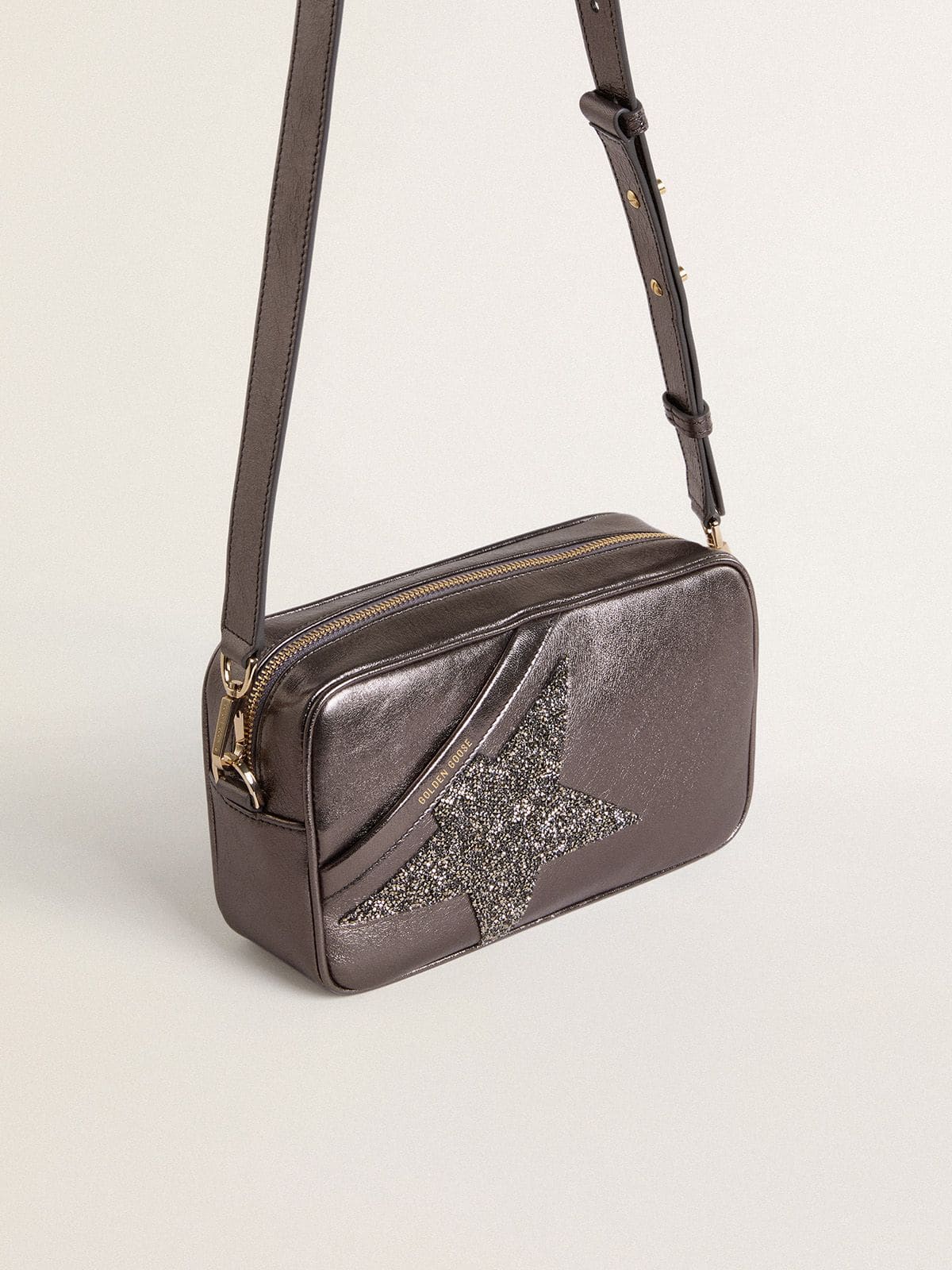 Star Bag in gray metallic leather with Swarovski crystal star