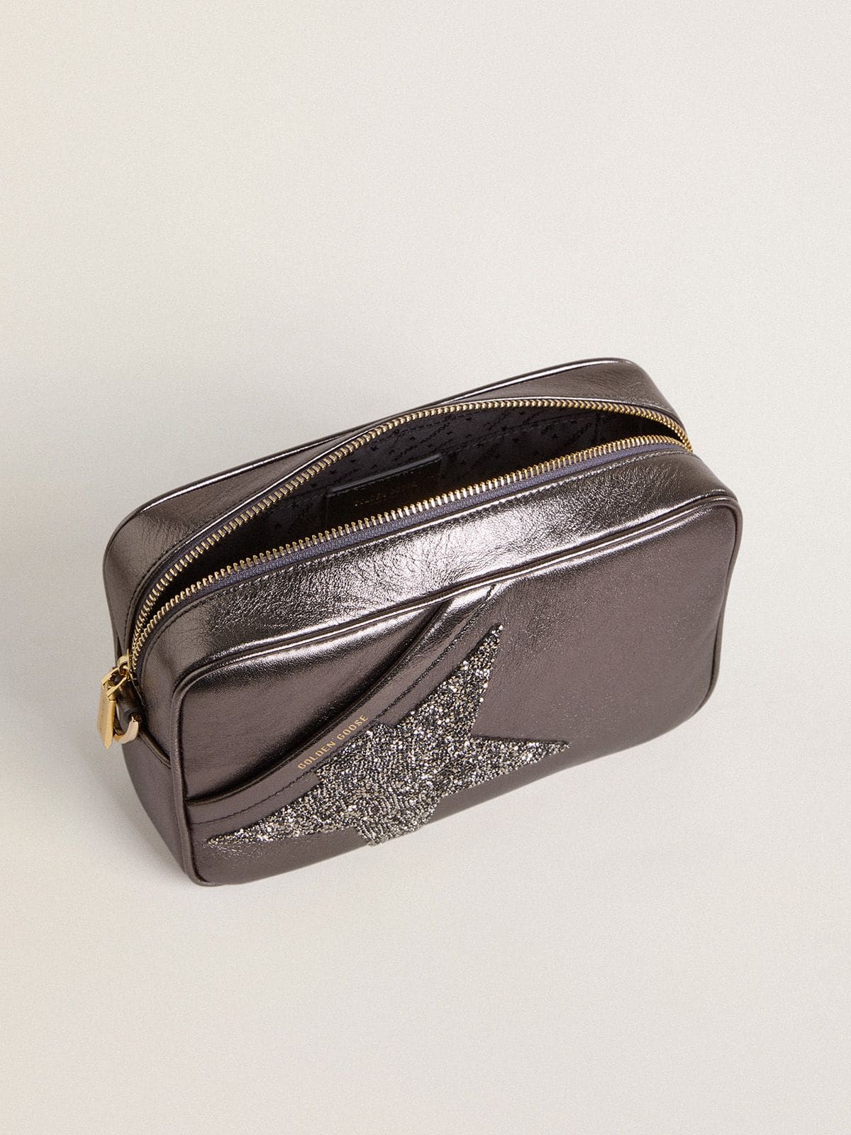 Star Bag in gray metallic leather with Swarovski crystal star