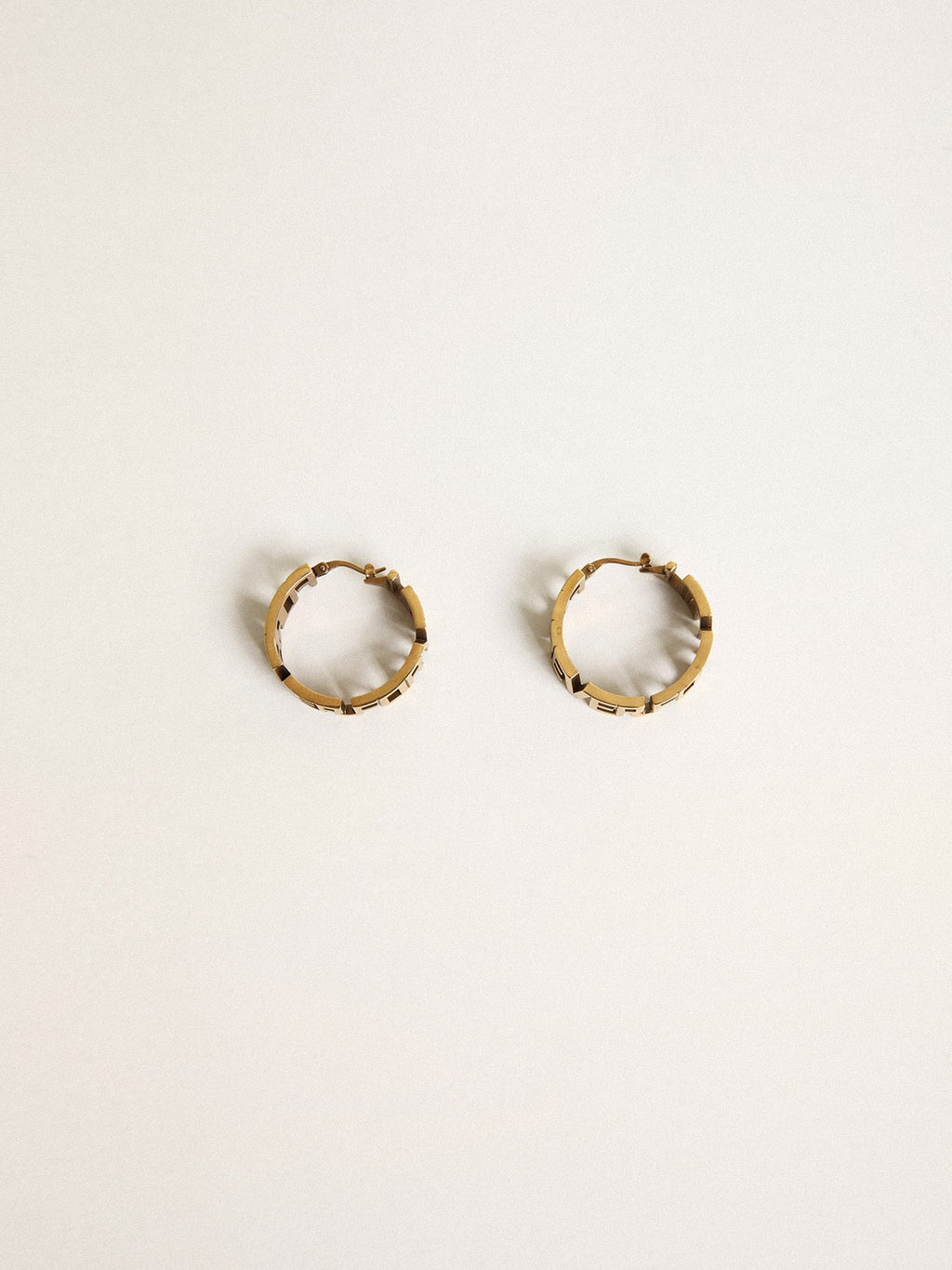 Hoop earrings in antique gold color with Forever For You lettering
