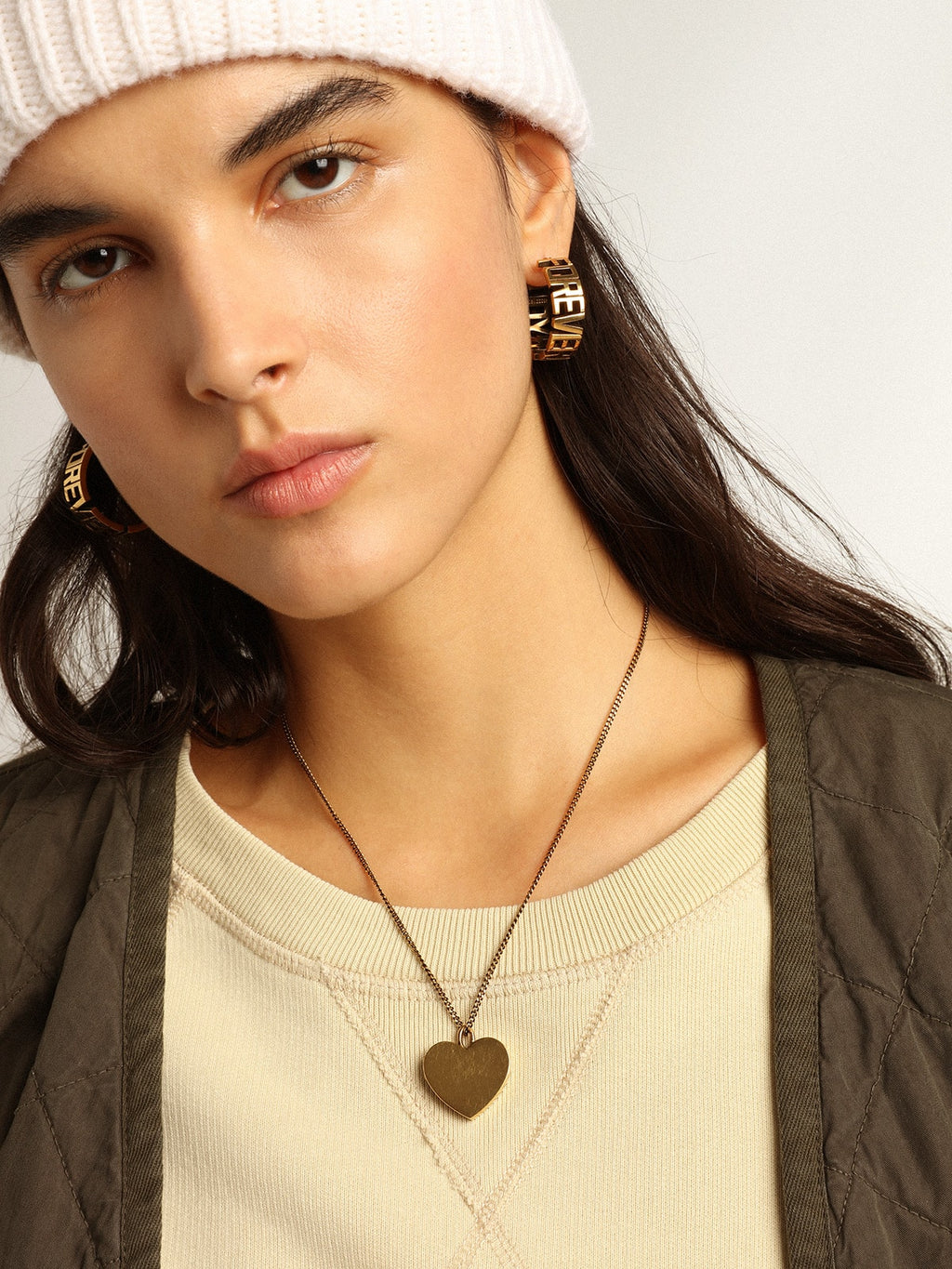 Necklace in antique gold color with heart charms