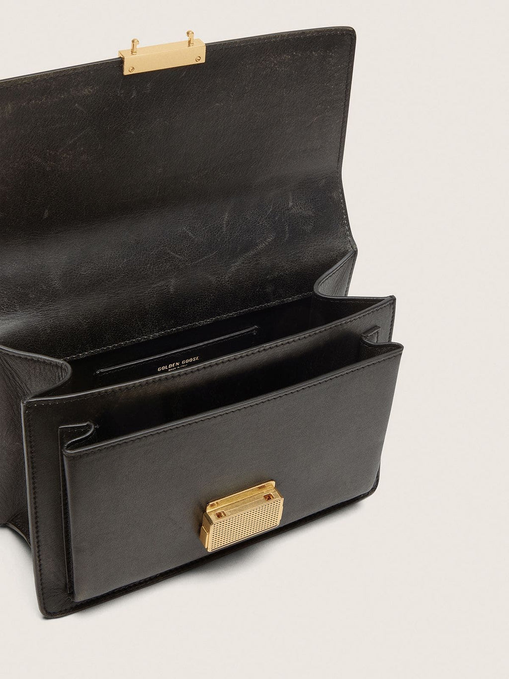 Venezia Bag in black distressed leather with gold details