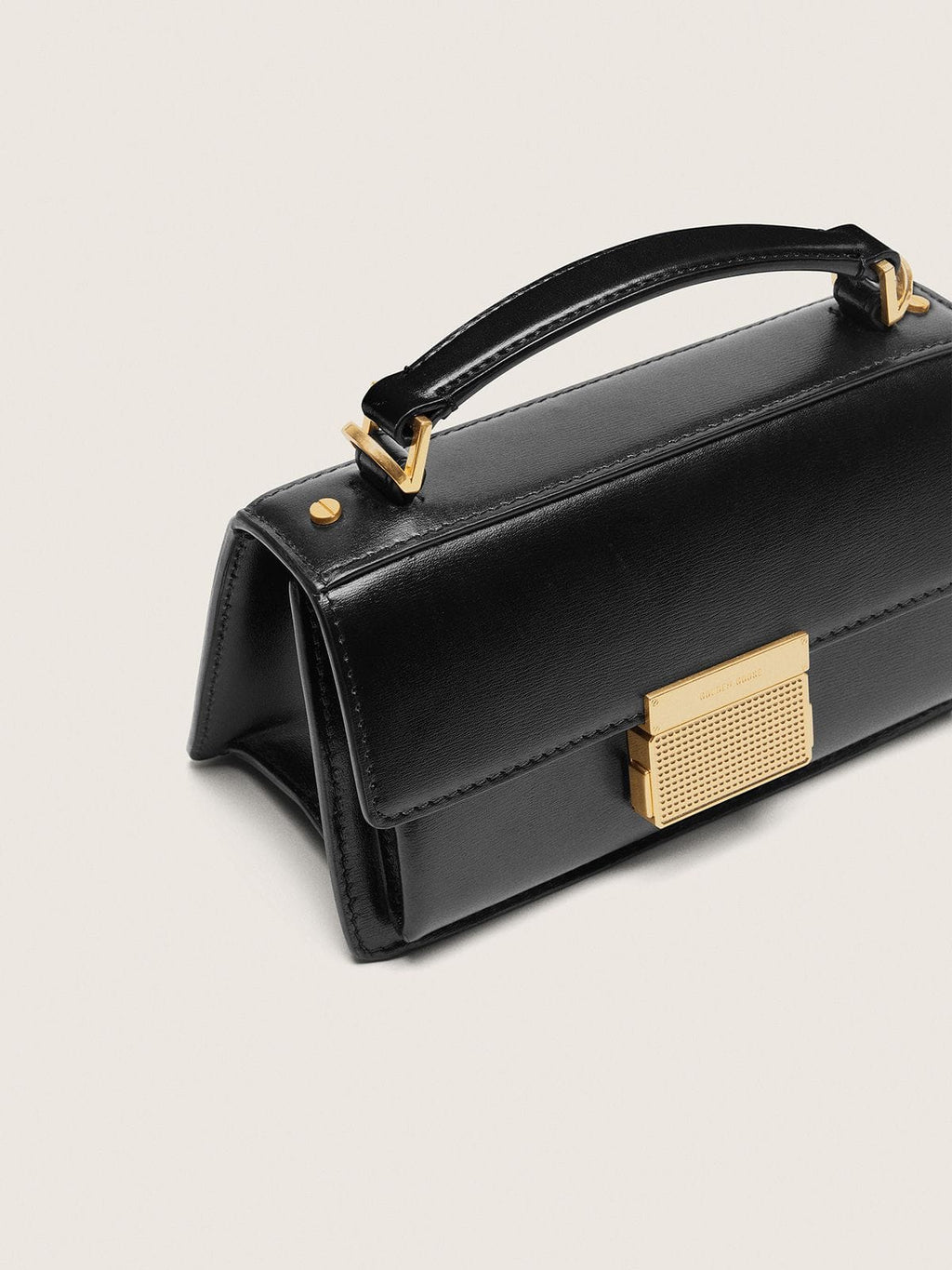 Small Venezia Bag in black boarded leather with gold details