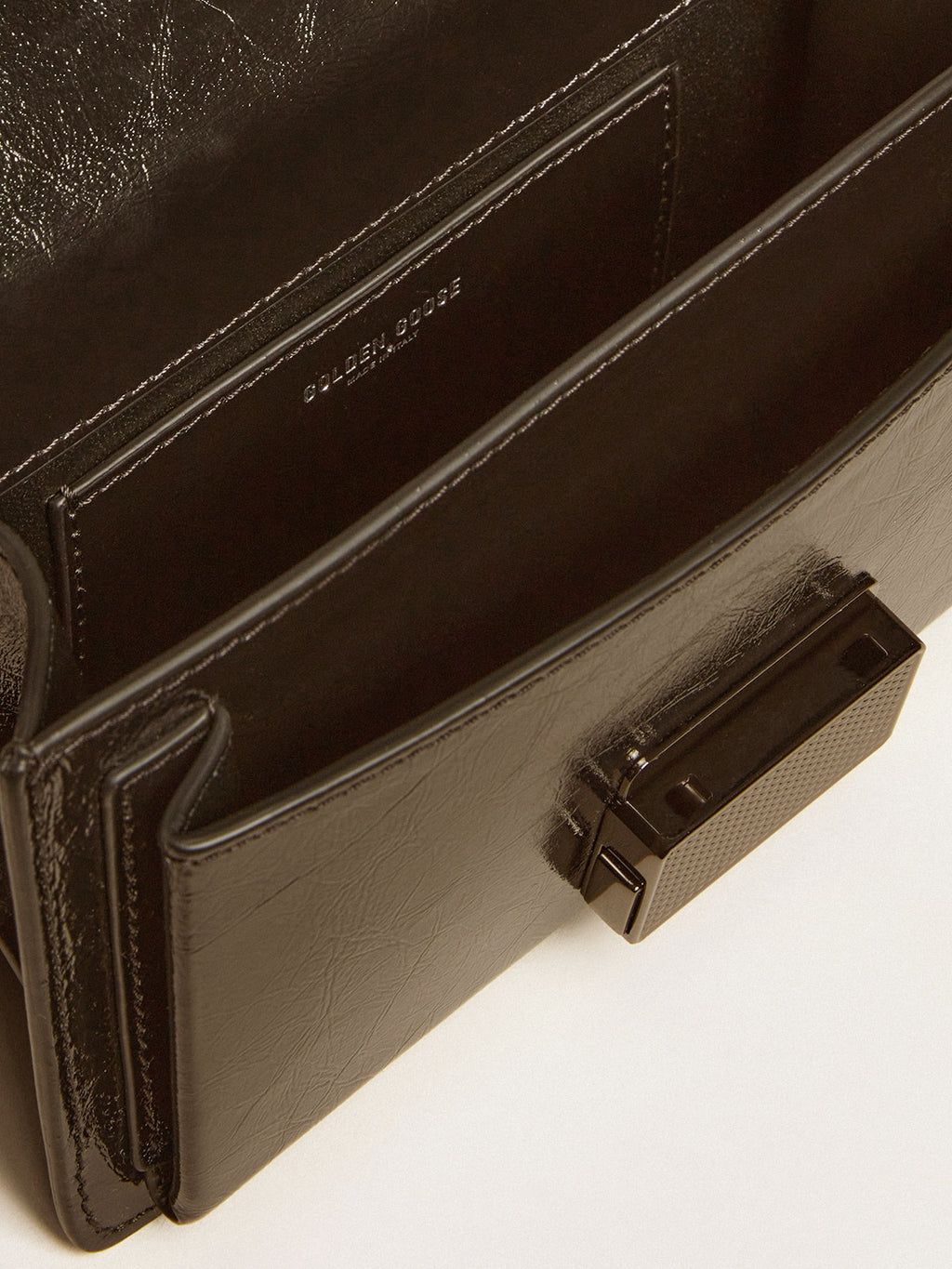 Small Venezia Bag in black metallic leather with black details