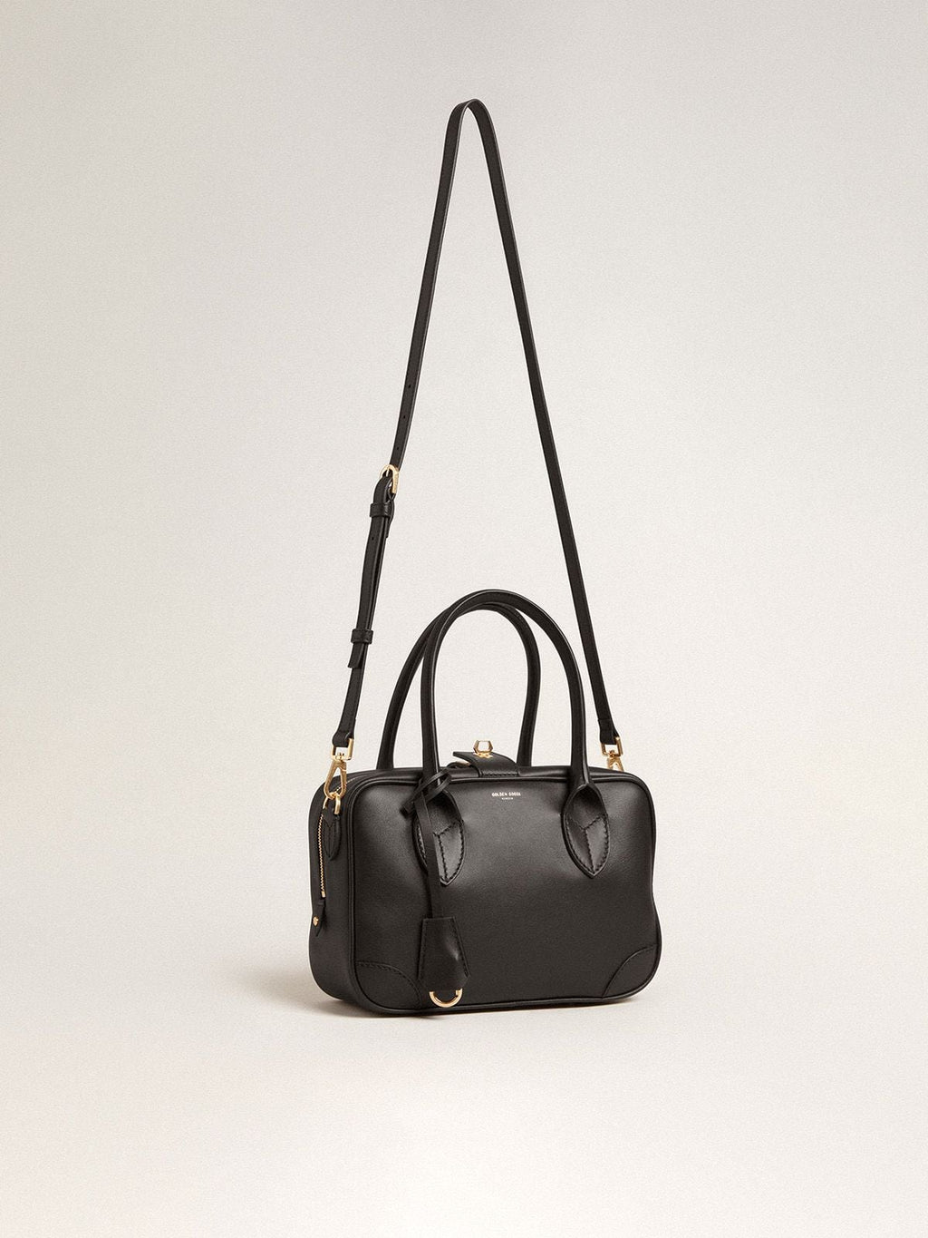 Vita Bag in smooth black leather with gold details