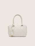 Vita Bag in butter-colored sheepskin leather with gold details