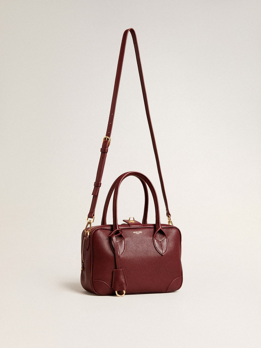 Vita Bag in burgundy sheepskin leather with gold details