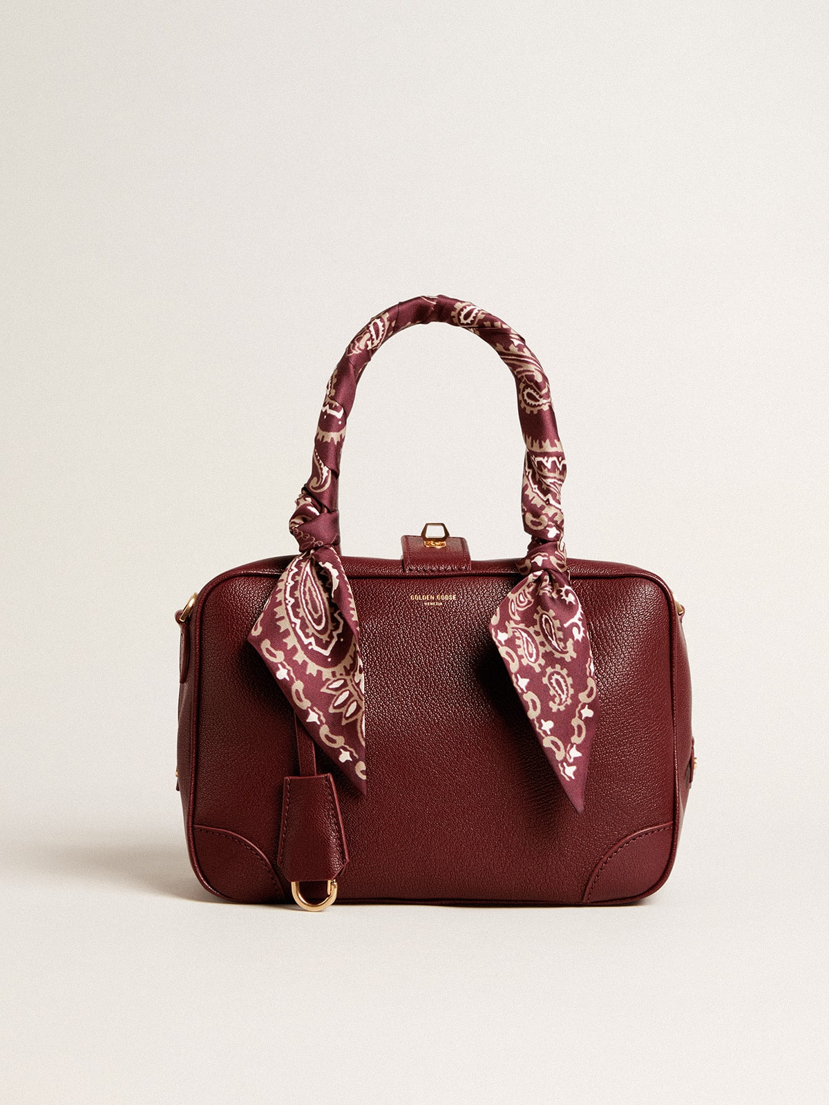 Vita Bag in burgundy sheepskin leather with gold details
