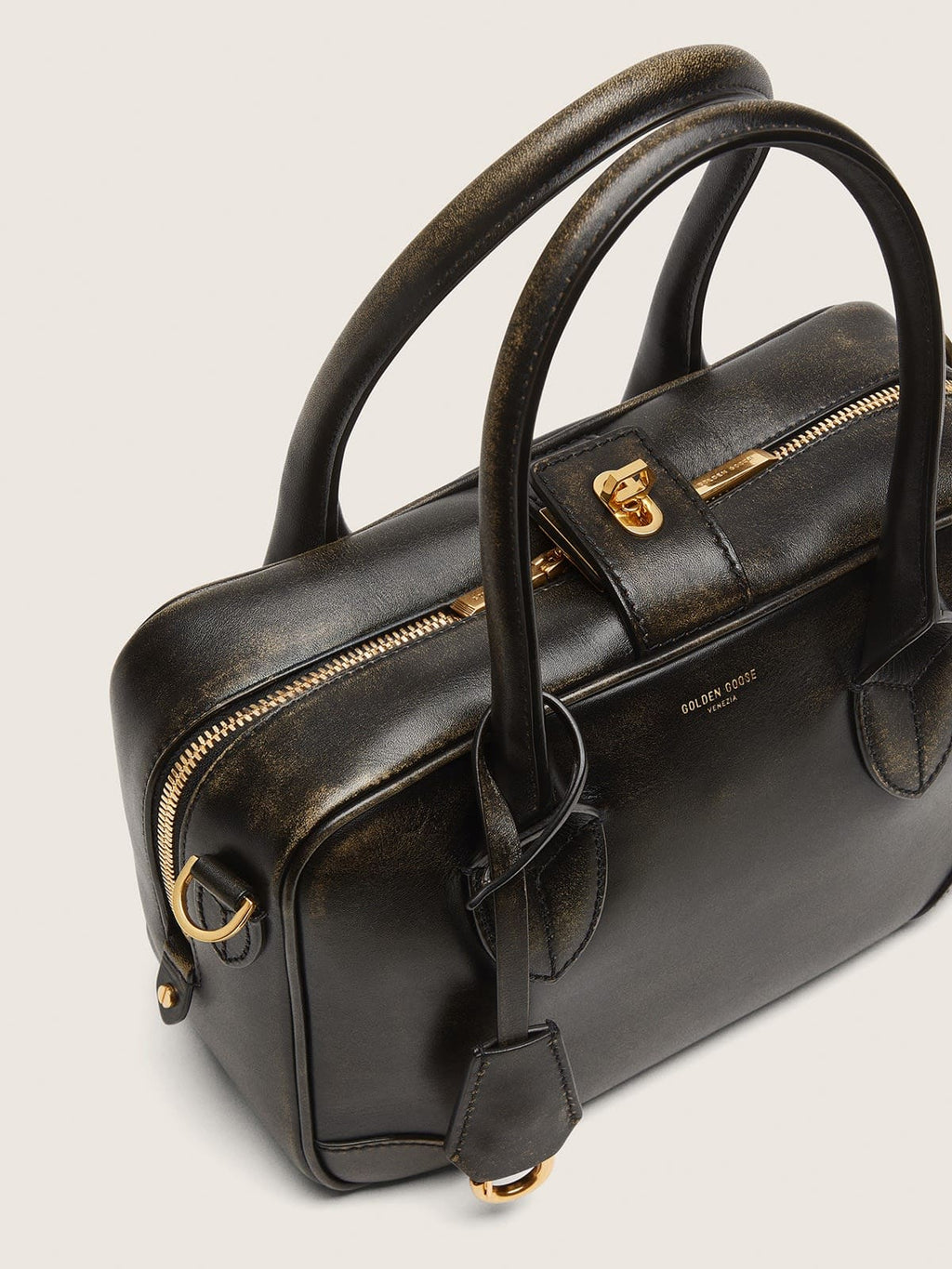 Vita Bag in black distressed leather with gold details