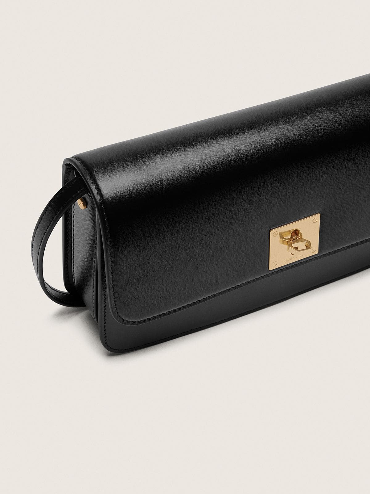 Gioia Bag in black boarded leather with gold details