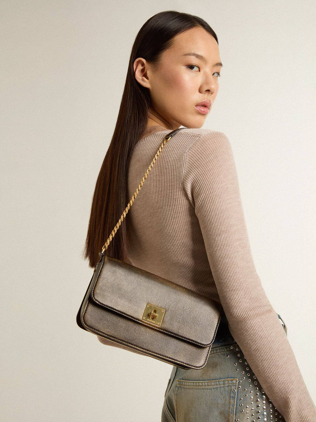 Gioia Bag in black vintage leather with gold details