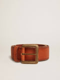 Belt in tan-colored washed leather with raised print