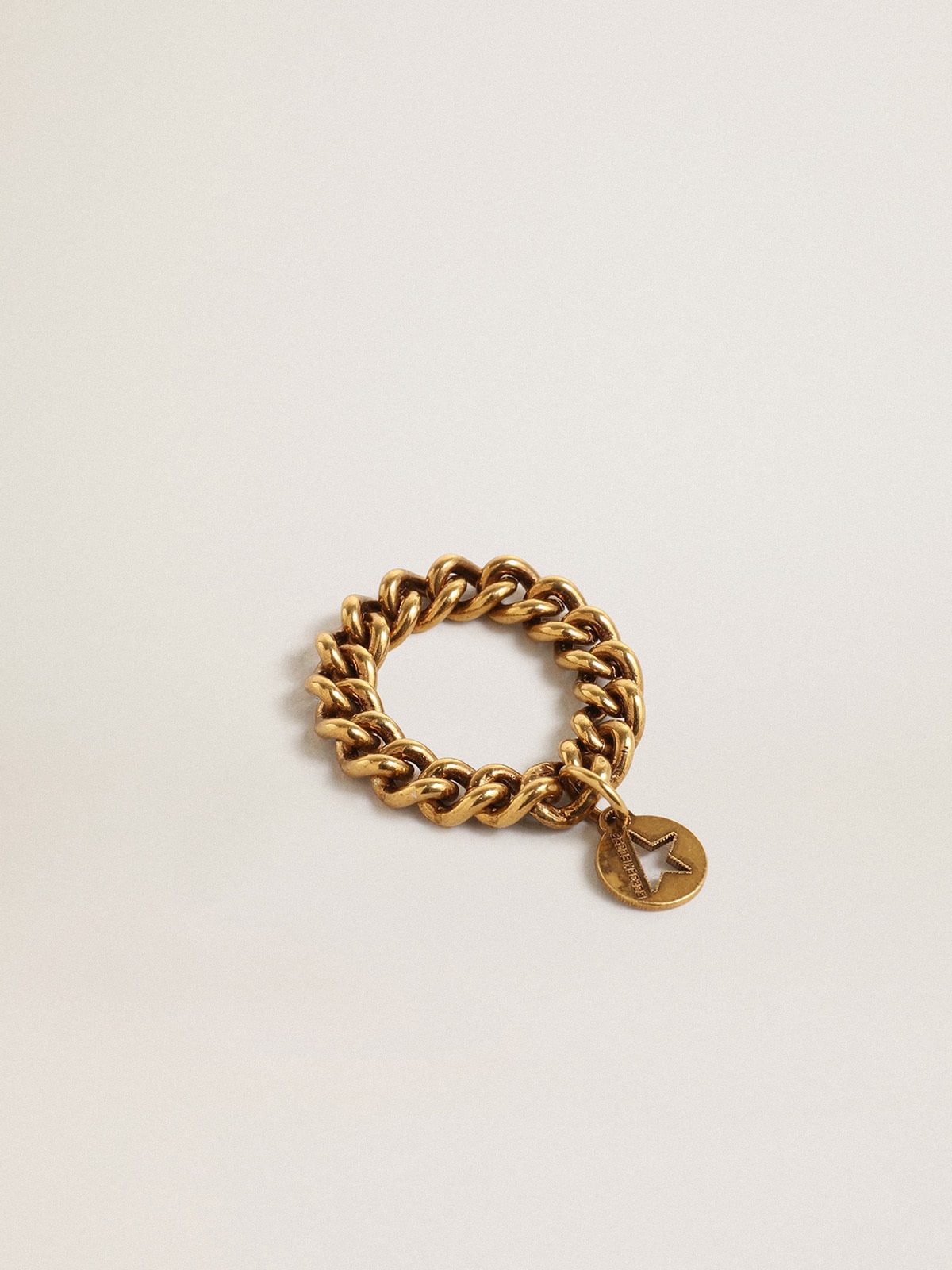 Ring in antique gold color with flexible links