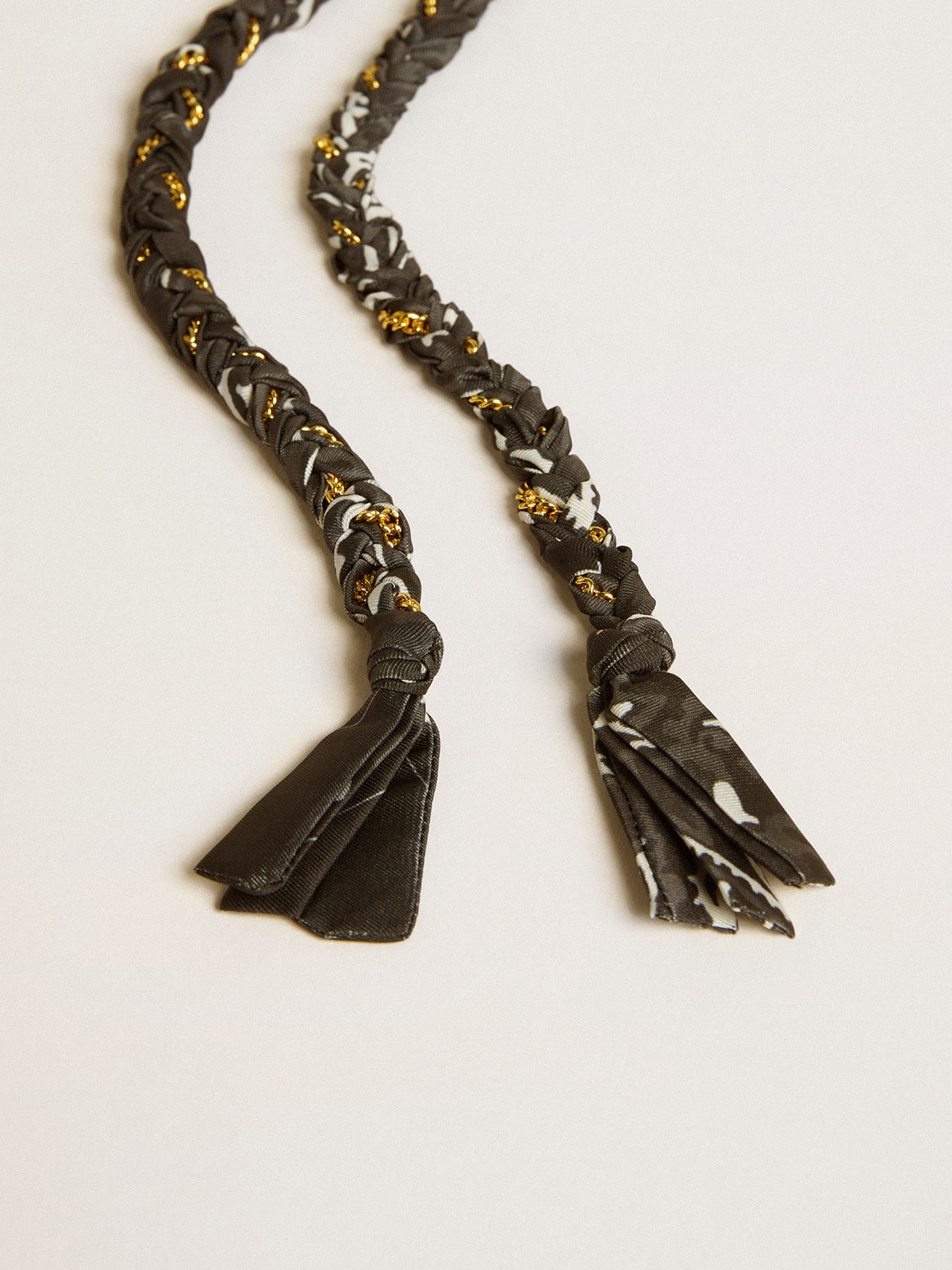 Black braided fabric charm with brass chain