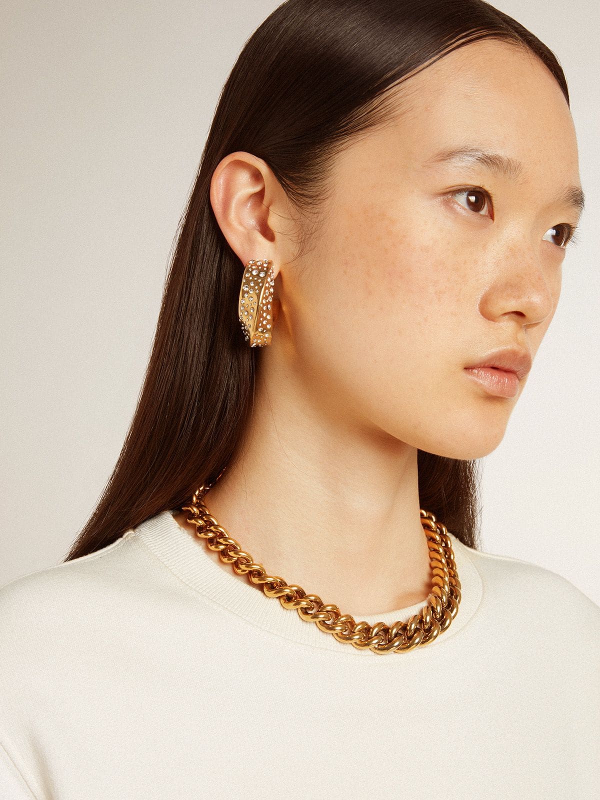 Gold hoop earrings with crystals