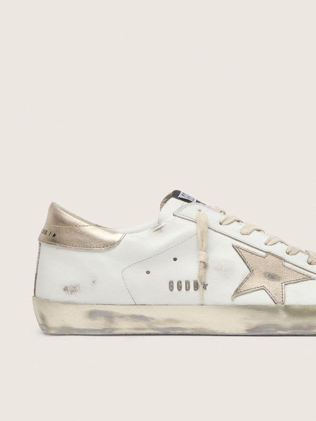Women's Super-Star with gold sparkle foxing and metal stud lettering
