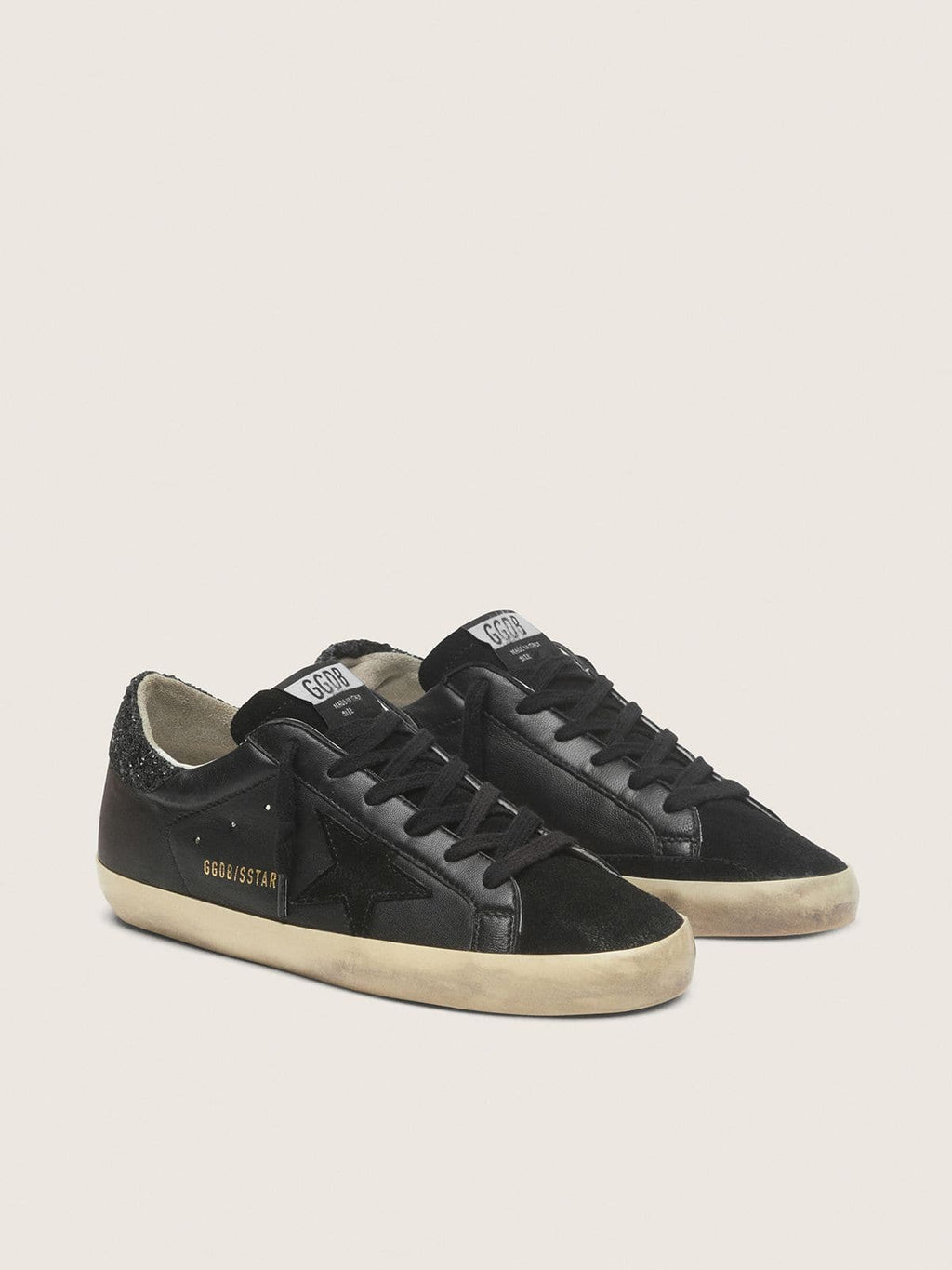 Women's Super-Star in black nappa with black star and glitter heel tab
