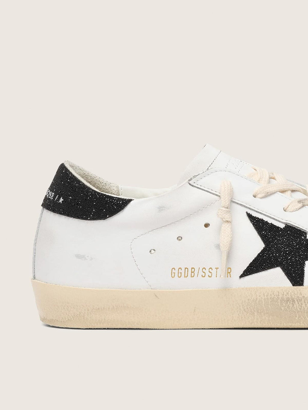 Women’s Super-Star with a black Swarovski crystal star and heel tab