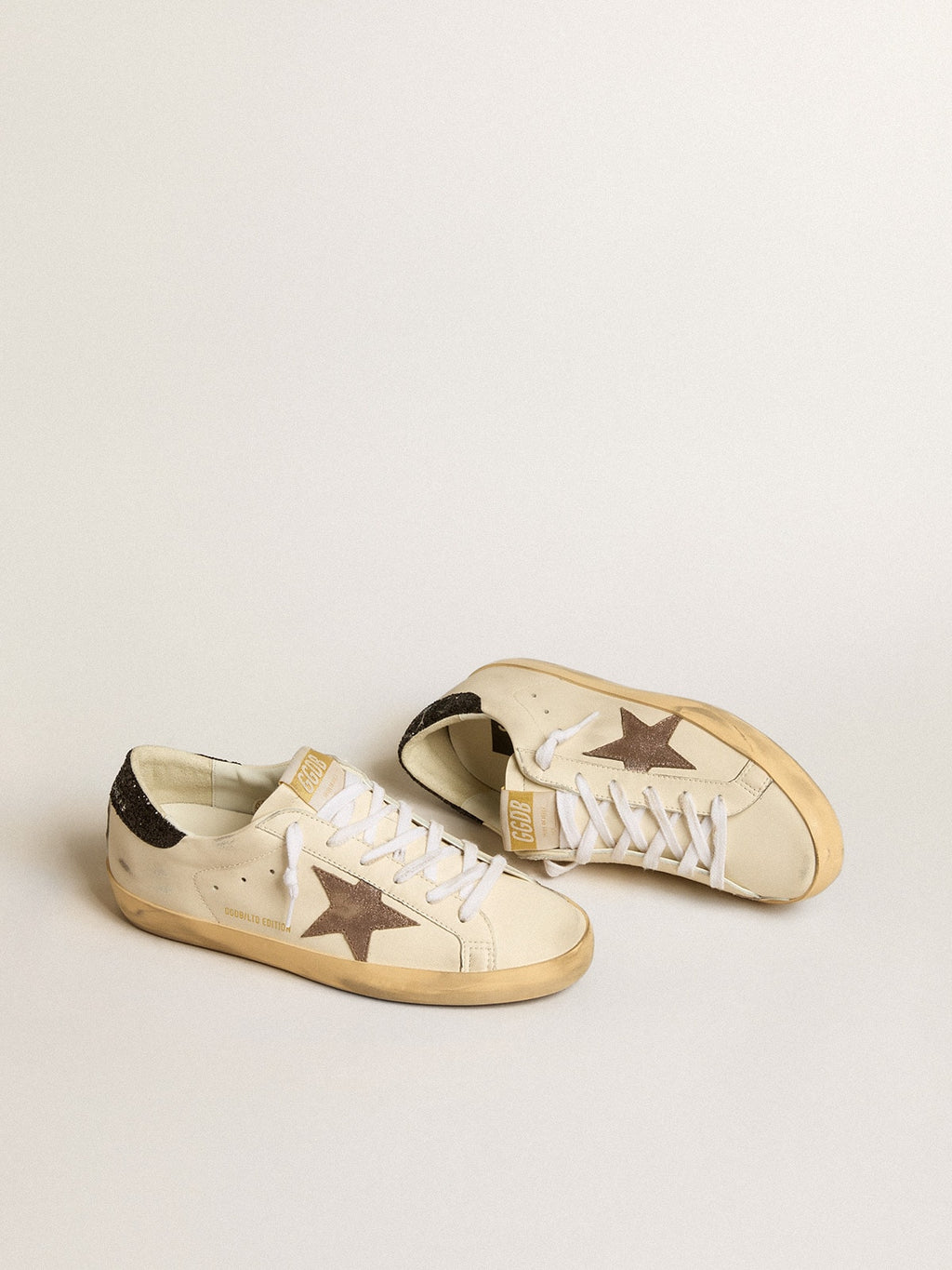 Super-Star LTD with laminated leather star and black glitter heel tab