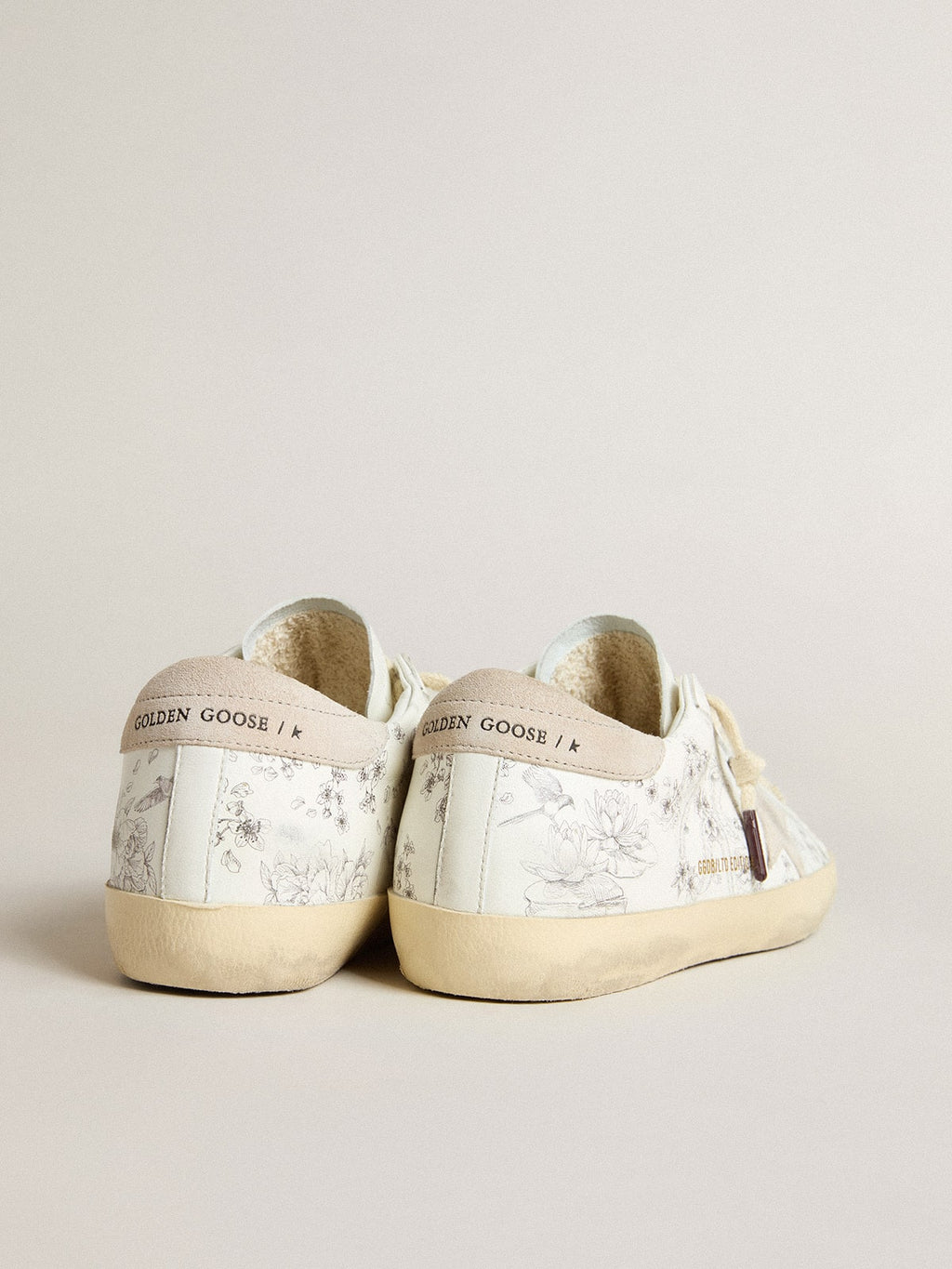 Women’s Super-Star LTD CNY in white leather with lettering on the upper