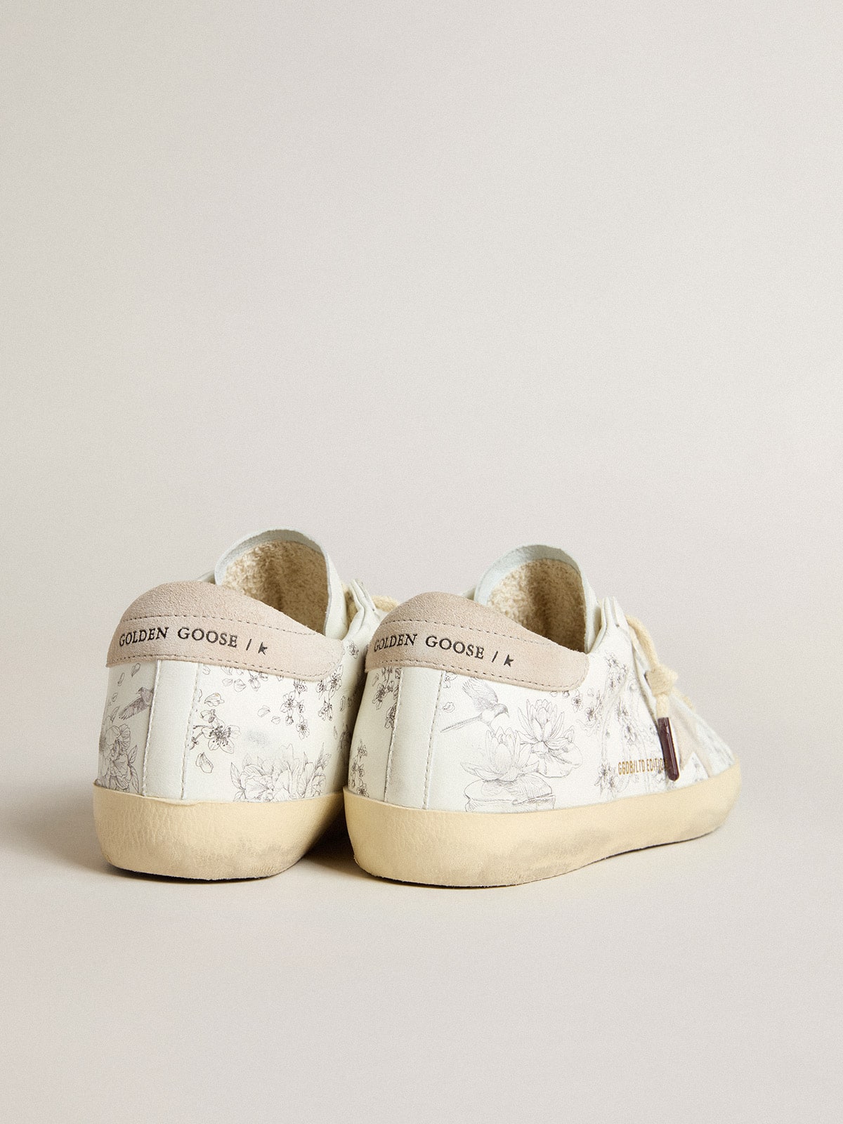 Women’s Super-Star LTD CNY in white leather with lettering on the upper