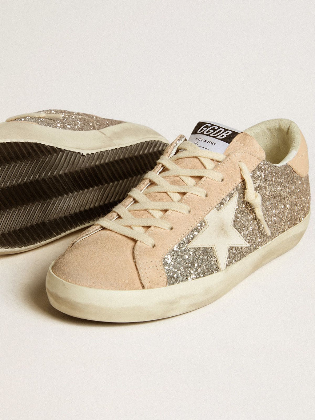 Women’s Super-Star in silver glitter with leather star and heel tab