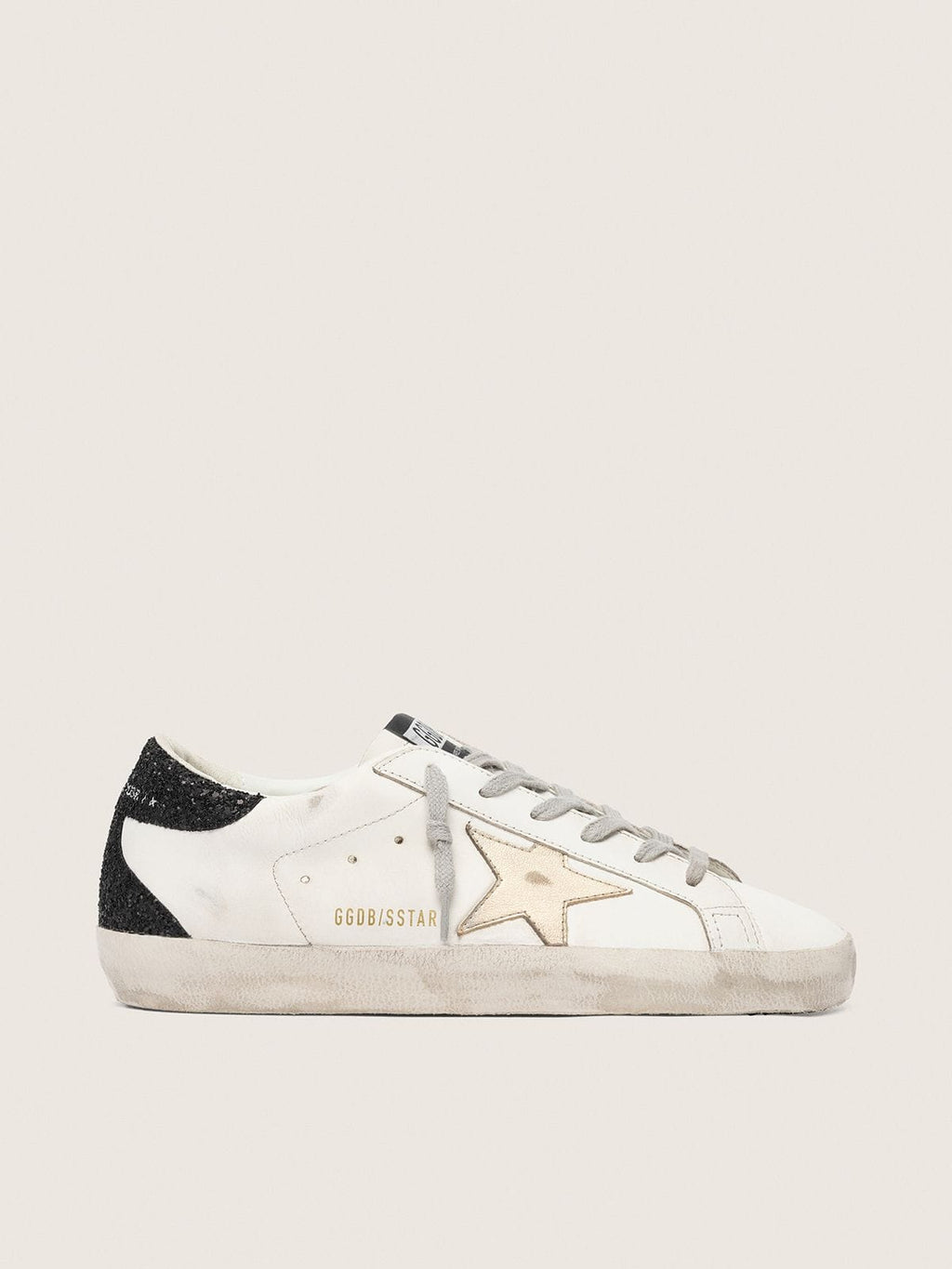 Women's Super-Star with gold star and black glitter heel tab
