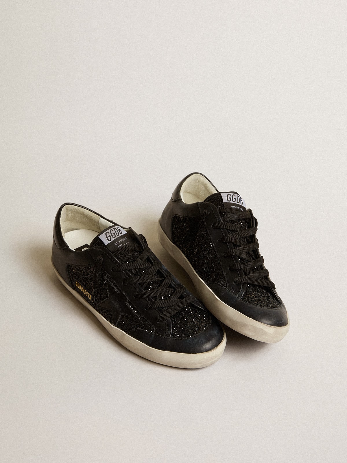 Women's Super-Star in black nappa and glitter with glossy black leather star