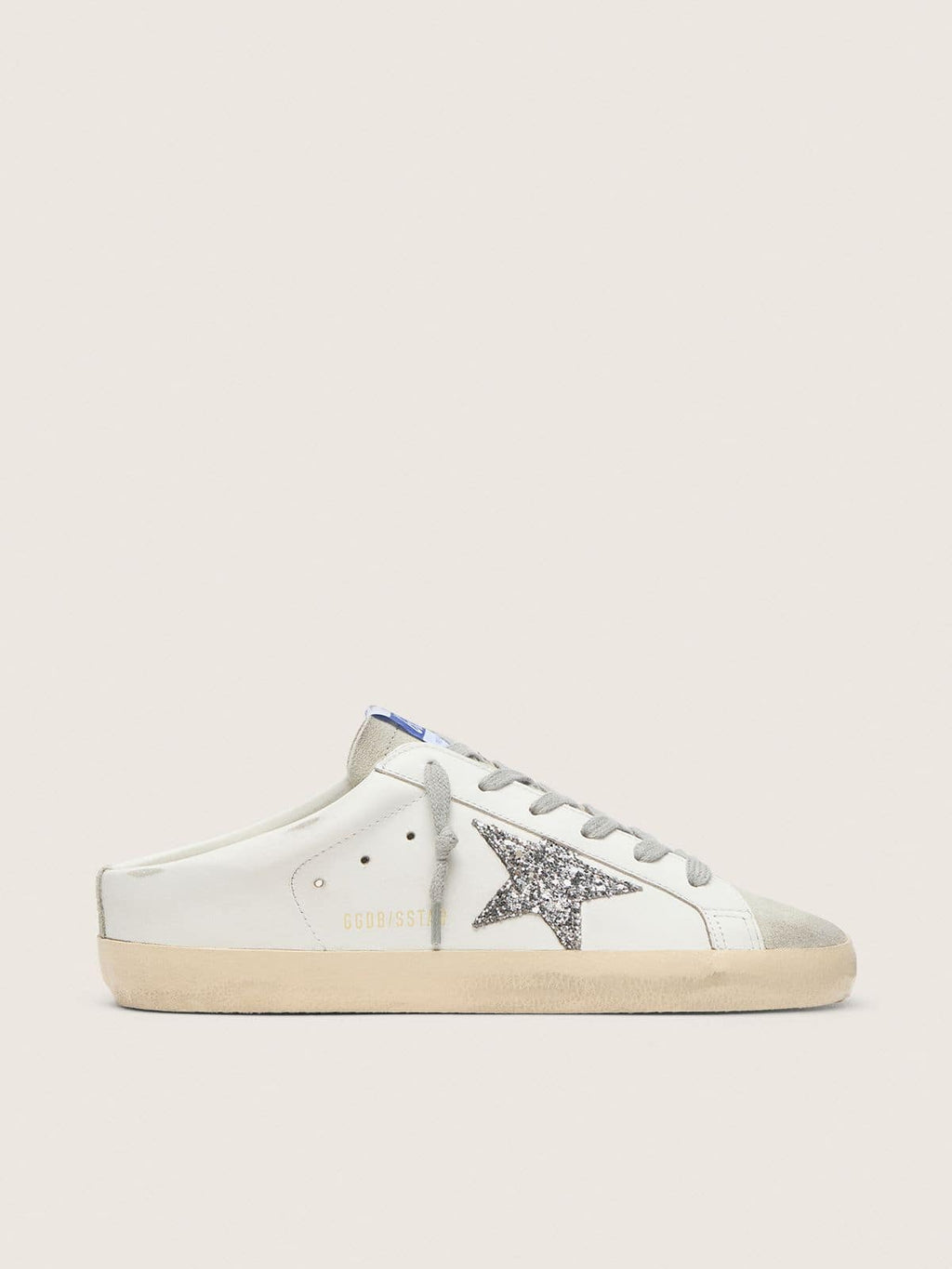 Super-Star Sabot with a platinum glitter star and suede tongue